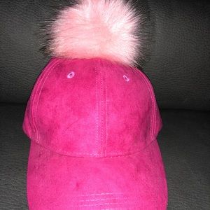 Suede pink hat with fur ball on top